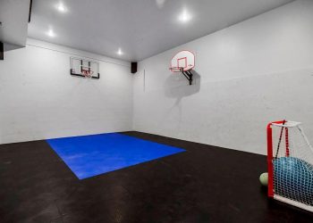 Discover Your Dream Mansion with a Private Sports Court in Stilwell’s Idyllic Setting